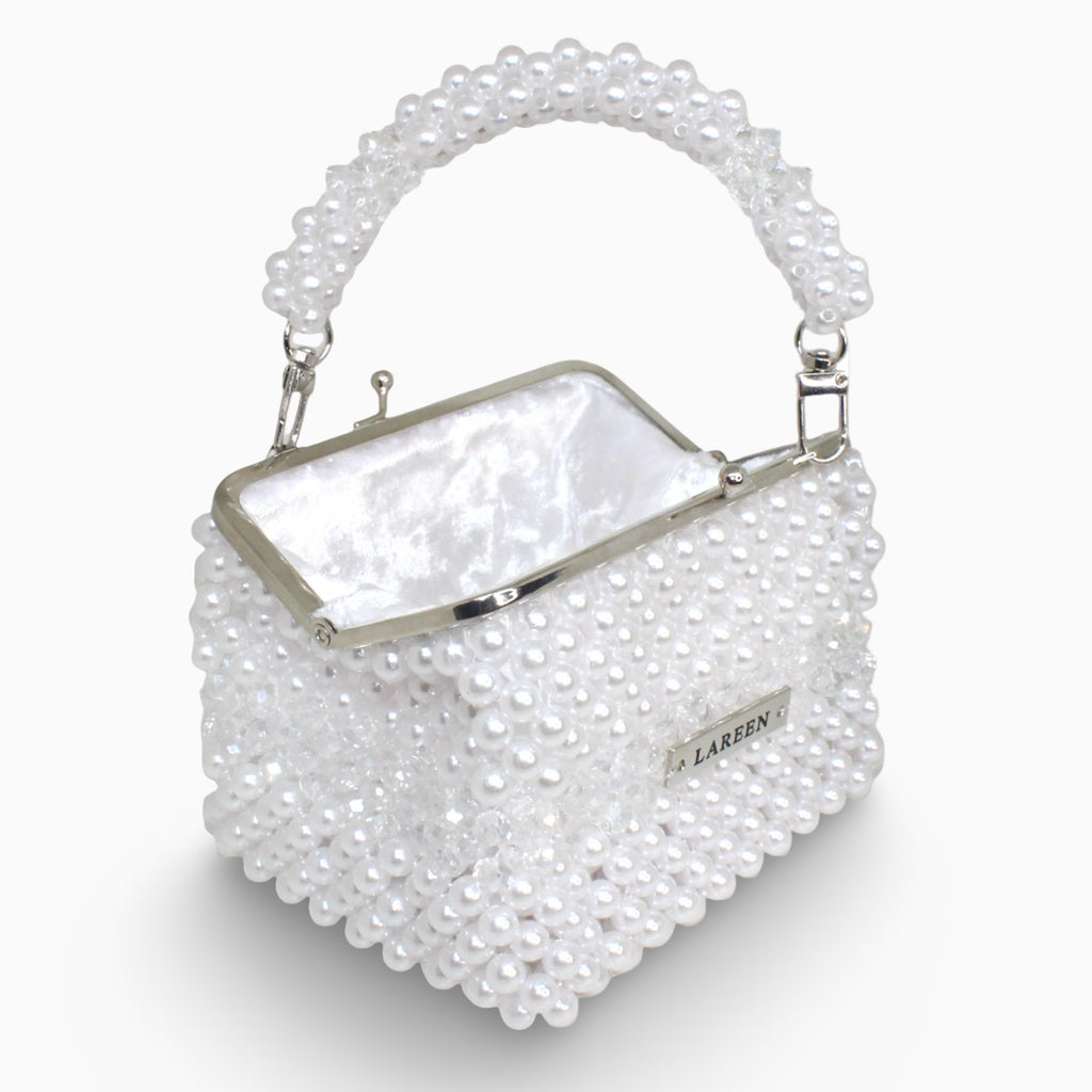 Aurélia Pearl Midi open, showing the interior and frame