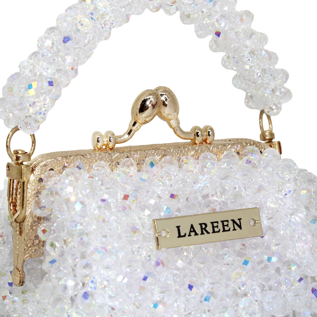 Close-up of crystal beadwork and gold details on Aurélia Crystal Mini