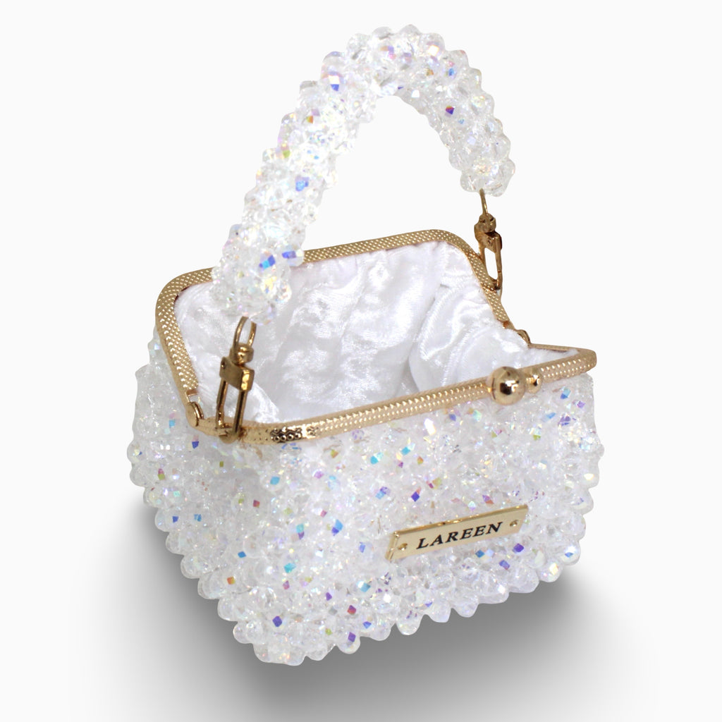 Aurélia Crystal Mini open, showing the interior and gold frame