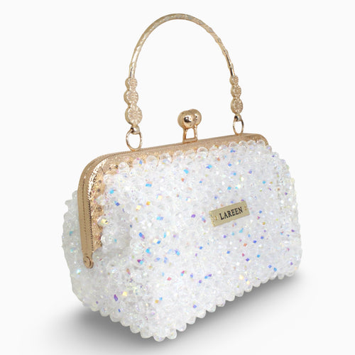 Aurélia Crystal crystal bag with gold handle, angled view
