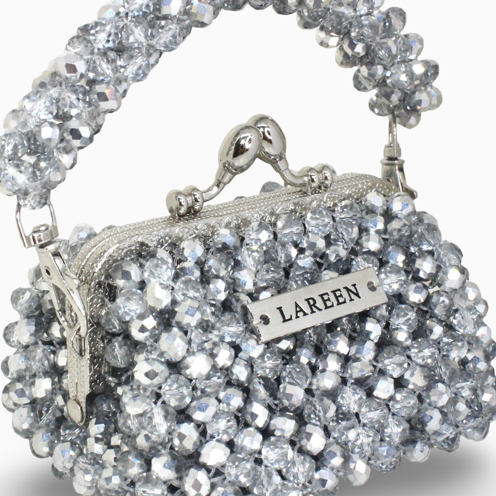 Close-up of silver beadwork on Aurélia Lumière Mini