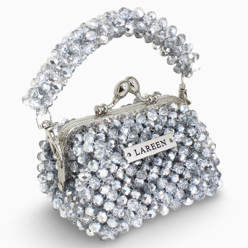 Aurélia Lumière Mini silver beaded mini bag, angled view