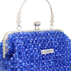 Close-up of deep blue beadwork on Aurélia Saphir