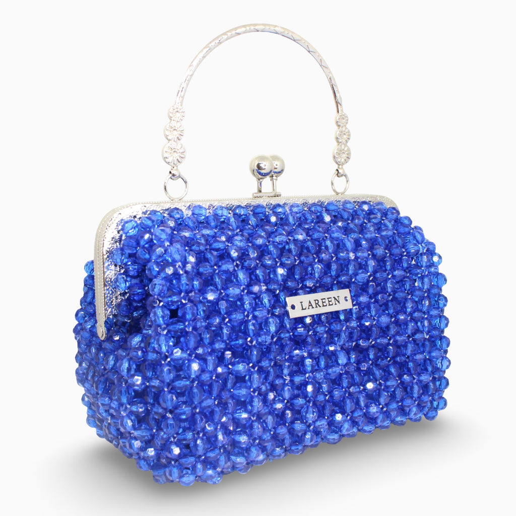 Aurélia Saphir blue beaded bag, angled view